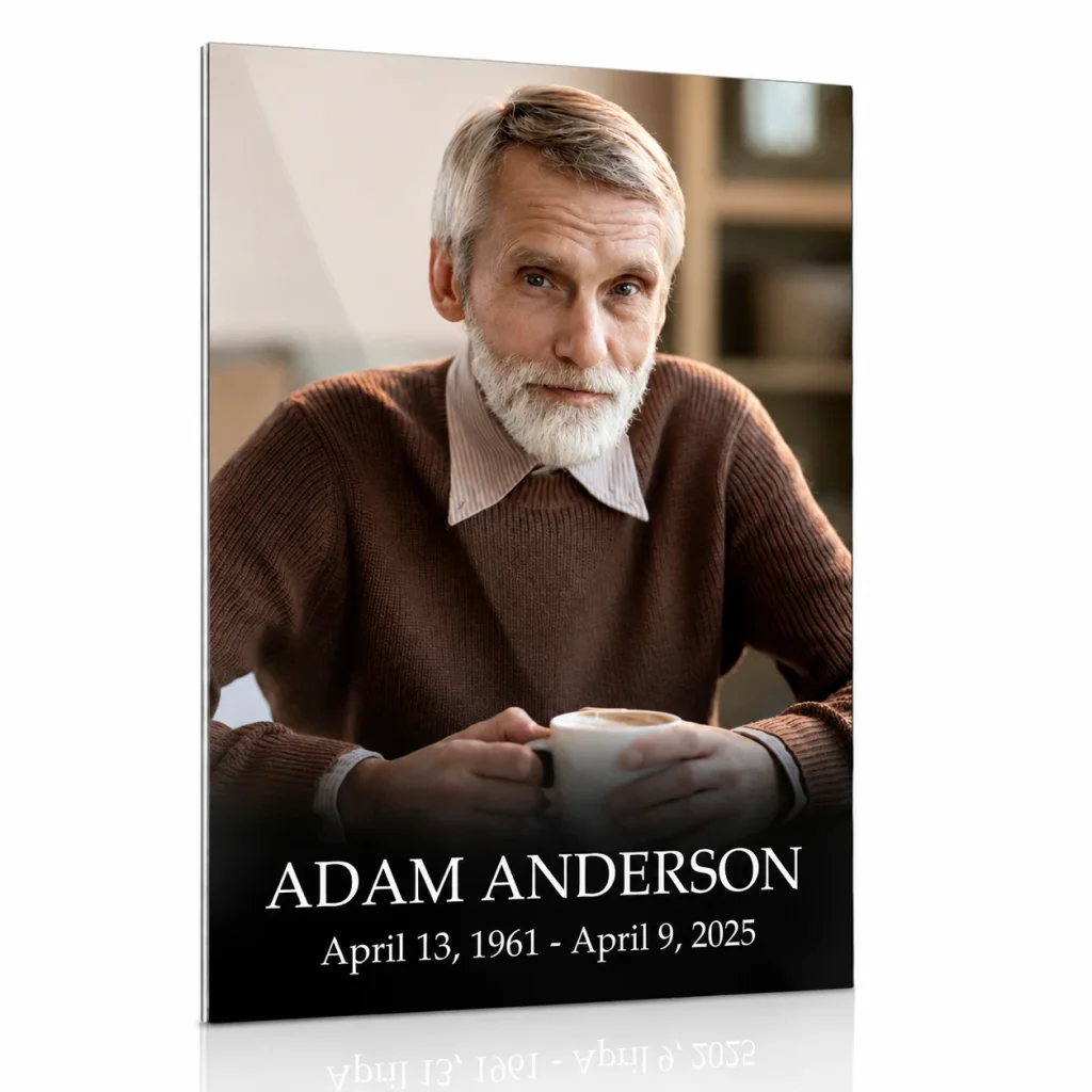Glass photo plaque for grave featuring portrait, name and dates
