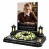 Glass photo plaque for headstone with name and dates on black granite monument