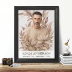 Framed memorial portrait of deceased with decorative floral design and name plate