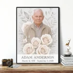 Framed memorial portrait of deceased with floral motif, name and dates