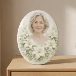 photo ceramic oval plaque with woman's portrait and white lily design