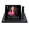 Glass photo plaque for grave featuring portrait, cross, name and dates on granite base