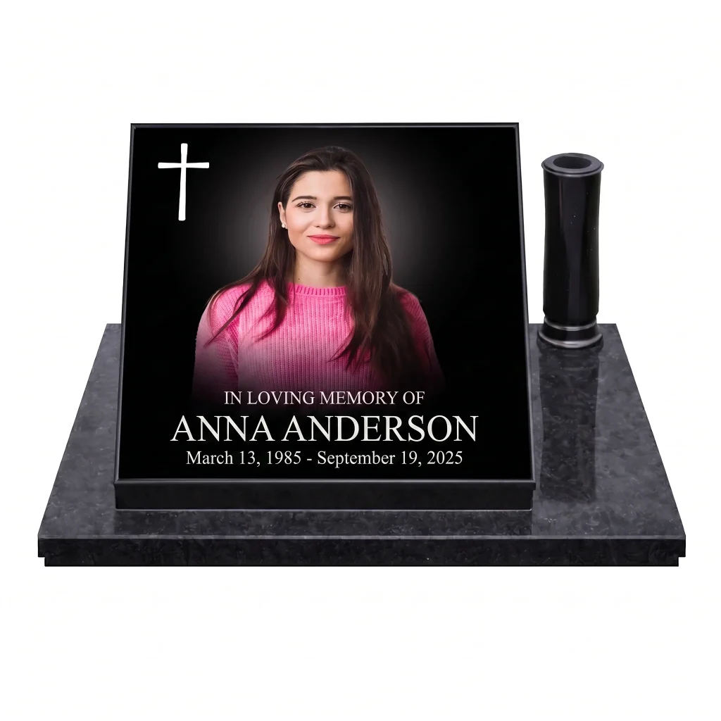 Glass photo plaque for grave featuring portrait, cross, name and dates on granite base