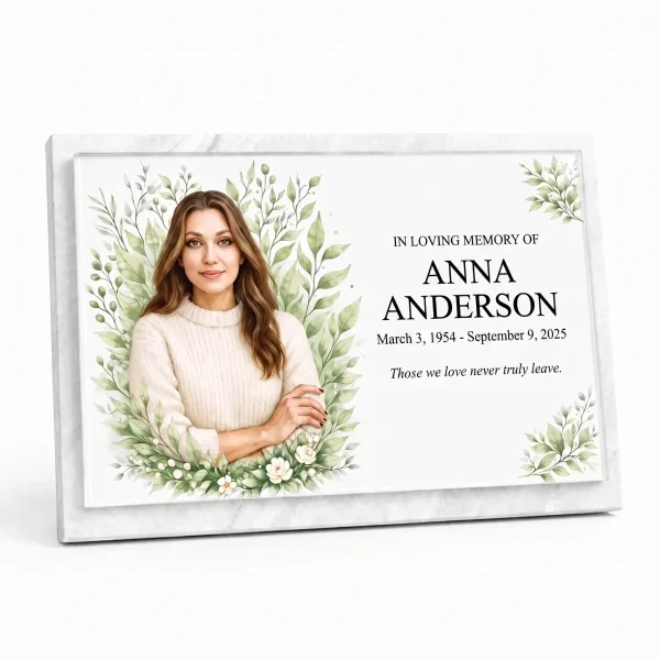 Glass photo plaque for grave with name and dates on marble base