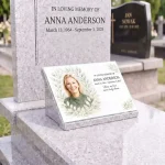Glass photo plaque for grave featuring portrait, name and dates