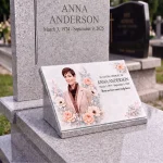 Glass photo plaque for grave featuring personalized name, dates and floral memorial design