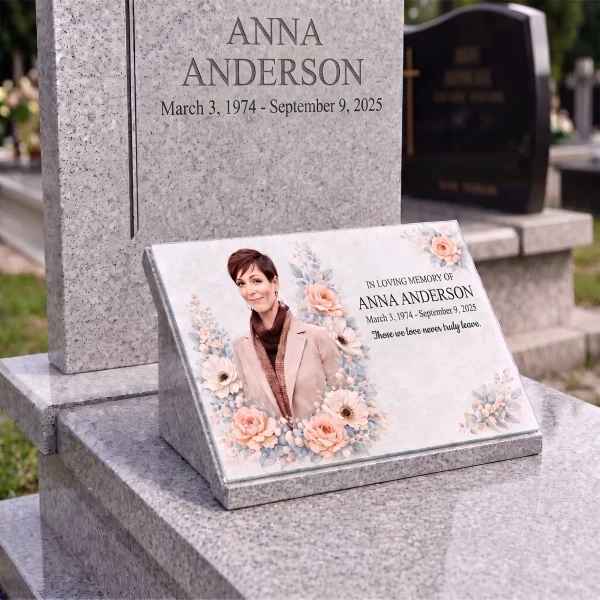 Glass photo plaque for grave featuring personalized name, dates and floral memorial design