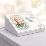 glass photo plaque for grave with name and dates on stone base