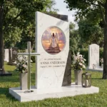 Figure of an angel for a grave – a glass decoration in the form of a round glass panel mounted in a modern headstone
