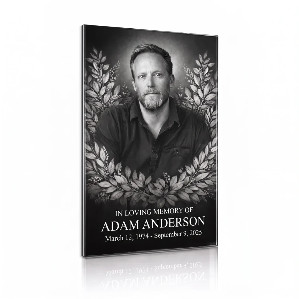 tempered glass memorial plaque with black and white photo of deceased and floral wreath