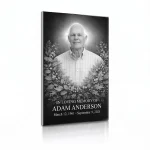 tempered glass memorial plaque with black and white photo of deceased and floral wreath