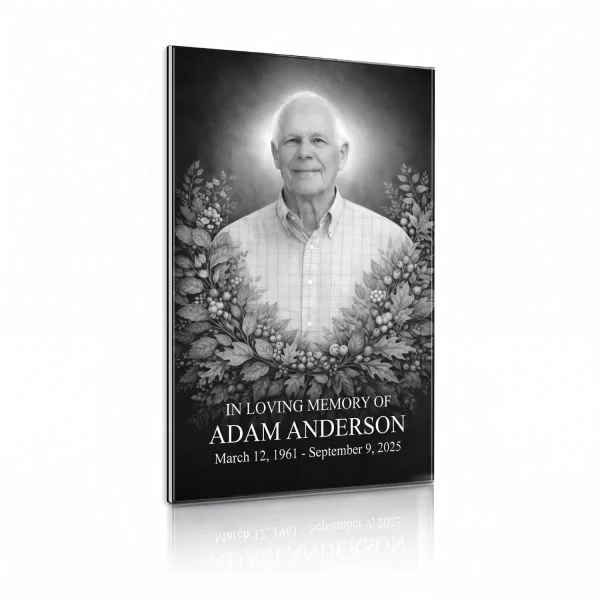 tempered glass memorial plaque with black and white photo of deceased and floral wreath