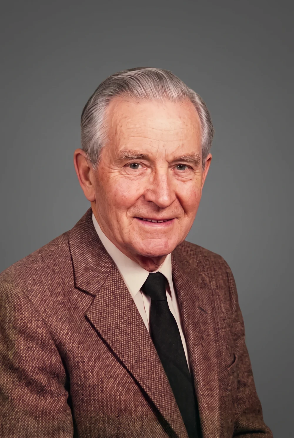 colour photo for headstone showing an elderly man in a tweed jacket