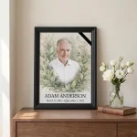 Custom memorial portrait of a man framed with a floral wreath design