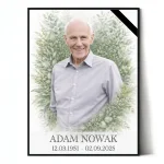 Personalizowana tablica na pomnik z portretem zmarłego i motywem roślinnym