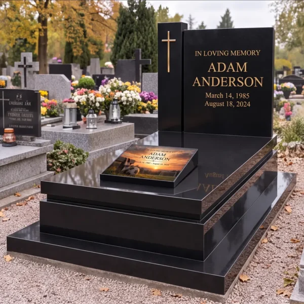 Memorial plaque with a football and scarf on the slab of a black grave with a cross and gold lettering