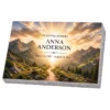 Memorial plaque in tempered glass with a mountain trail in the sunlight, on a granite base