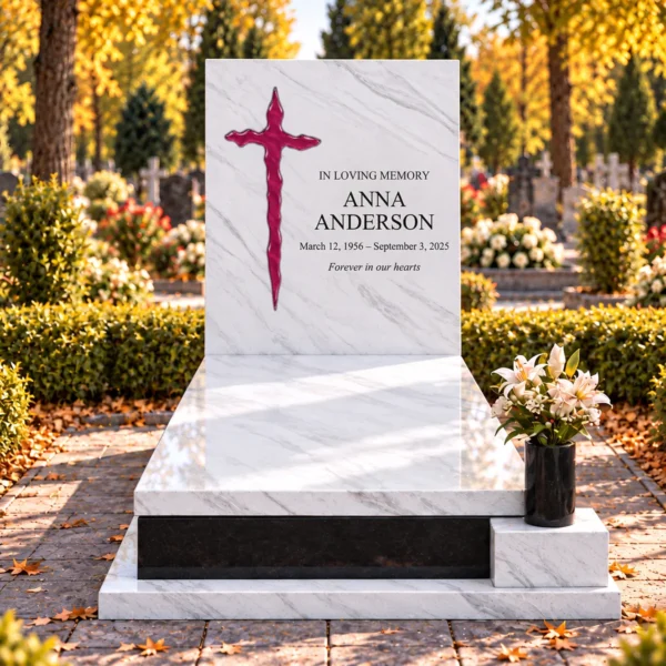 burgundy irregular glass cross bonded into the tablet of a white stone headstone beside the inscription, front view